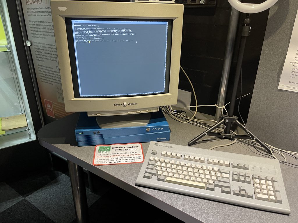 A beige desktop PC and CRT monitor on display